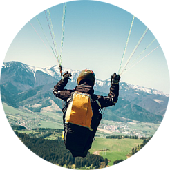 paragliding over a volcano or waterfall